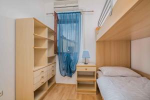 Postel nebo postele na pokoji v ubytování Apartment in Klimno - Insel Krk 41835