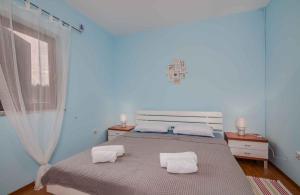Postel nebo postele na pokoji v ubytování Apartment in Klimno - Insel Krk 41835