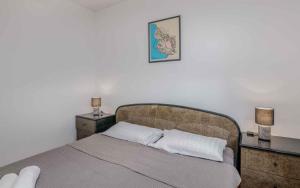 Postel nebo postele na pokoji v ubytování Apartment in Klimno - Insel Krk 41835