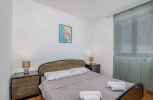 Postel nebo postele na pokoji v ubytování Apartment in Klimno - Insel Krk 41835