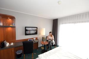 Postel nebo postele na pokoji v ubytování Hotel Freihof