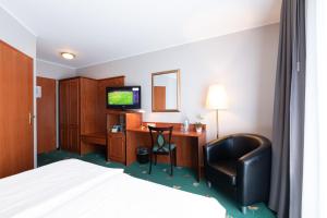 TV a/nebo společenská místnost v ubytování Hotel Freihof