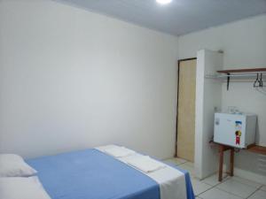 Postel nebo postele na pokoji v ubytování Chacara Cabana dos Lagos