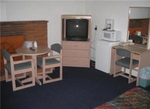 Kuchyň nebo kuchyňský kout v ubytování Hub Motel