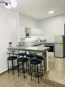 Kuchyň nebo kuchyňský kout v ubytování SUITES FullHouse