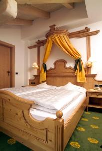 Postel nebo postele na pokoji v ubytování Hotel Flora