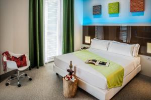 Postel nebo postele na pokoji v ubytování Hotel degli Arcimboldi