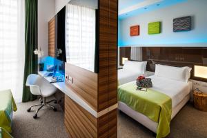 Postel nebo postele na pokoji v ubytování Hotel degli Arcimboldi