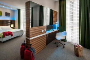 Postel nebo postele na pokoji v ubytování Hotel degli Arcimboldi