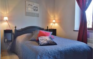 Ένα ή περισσότερα κρεβάτια σε δωμάτιο στο Two-Bedroom Holiday Home In Romery