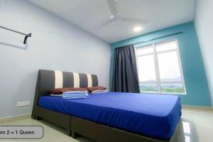 Een bed of bedden in een kamer bij LDH Ipoh Town Majestic Monstera Dream 3room2bath