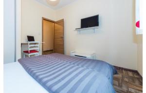 Postel nebo postele na pokoji v ubytování Three-Bedroom Holiday Home In Dubrava