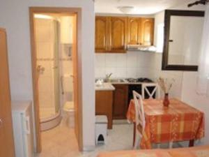 Kuchyň nebo kuchyňský kout v ubytování Apartment Marija