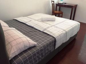Postel nebo postele na pokoji v ubytování Travellers Diary Guesthouse
