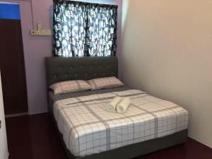 Postel nebo postele na pokoji v ubytování Travellers Diary Guesthouse