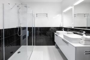Kúpeľňa v ubytovaní Divat Apartments - Central Smart Homes