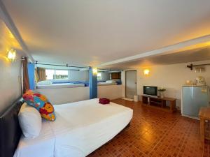 Kuchyň nebo kuchyňský kout v ubytování Chaipatchara Resort