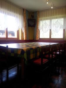 Televízia a/alebo spoločenská miestnosť v ubytovaní Chalet Belvedere