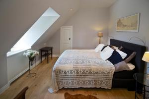 En eller flere senge i et værelse på Buitenplaats Welsdael