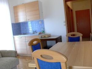 Kuchyňa alebo kuchynka v ubytovaní Apartments Petricevic