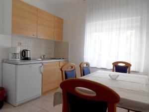 Kuchyňa alebo kuchynka v ubytovaní Apartments Petricevic