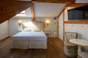 Postel nebo postele na pokoji v ubytování B&B Patatina