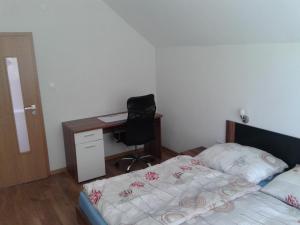 Posteľ alebo postele v izbe v ubytovaní Apartmán Liptov