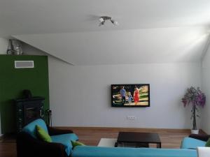 TV a/nebo společenská místnost v ubytování Apartmán Liptov