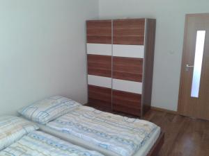 Posteľ alebo postele v izbe v ubytovaní Apartmán Liptov