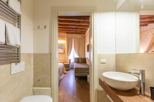 Koupelna v ubytování B&B Patatina + 37 fotografií