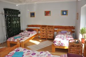 Postel nebo postele na pokoji v ubytování Katalin Vendégház