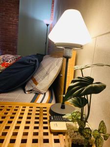 Postel nebo postele na pokoji v ubytování Sinnan12 Homestay桃園市民宿059號