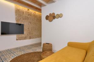 TV a/nebo společenská místnost v ubytování Casa En Grenyo, Javea