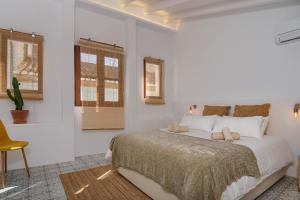 Postel nebo postele na pokoji v ubytování Casa En Grenyo, Javea
