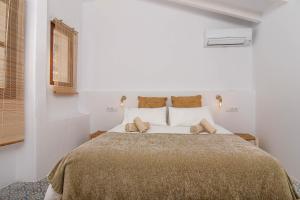 Postel nebo postele na pokoji v ubytování Casa En Grenyo, Javea