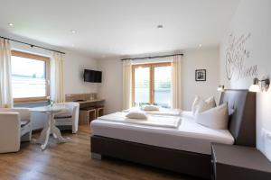 TV a/nebo společenská místnost v ubytování Hotel Garni Bergidyll - adults only