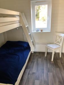 Postel nebo postele na pokoji v ubytování Färjas