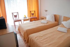 Postel nebo postele na pokoji v ubytování Hotel Cerna