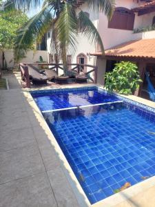 Bazén v ubytování Casa das Dunas nebo v jeho okolí
