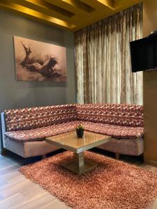 TV a/nebo společenská místnost v ubytování New W Hotel