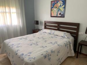 Łóżko lub łóżka w pokoju w obiekcie Chiclana casa maría