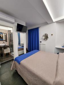 Postel nebo postele na pokoji v ubytování Oltremare Giovino