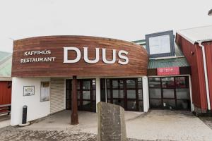a dunkin doughnut shop with a sign that readsuds at Hotel Duus by Keflavik Airport in Keflavík