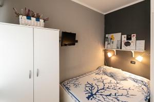 Postel nebo postele na pokoji v ubytování B&B Montecarlo