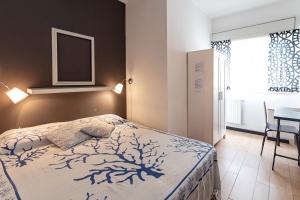 Postel nebo postele na pokoji v ubytování B&B Montecarlo