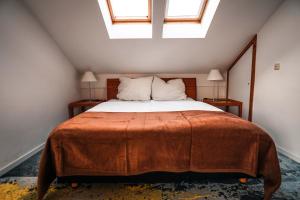 Postel nebo postele na pokoji v ubytování VISITALPS moderne Ferienwohnung nähe München u Salzburg