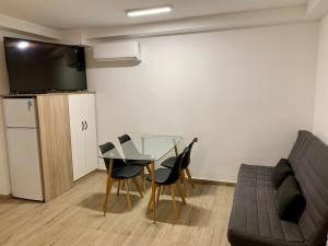 Televízia a/alebo spoločenská miestnosť v ubytovaní Arguineguin Beach Lux Solarium Sky