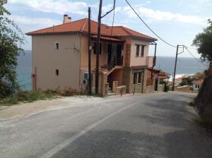 a house on the side of a road at Opalio pilio in Agios Ioannis Pelio