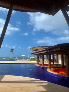 Bazén v ubytování Alquiler vacacional Apartamento en Playa Escondida Resort & Marina En el mar Caribe nebo v jeho okolí