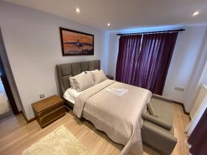 A bed or beds in a room at YELKEN PANSİYON Sinop Még 37 kép